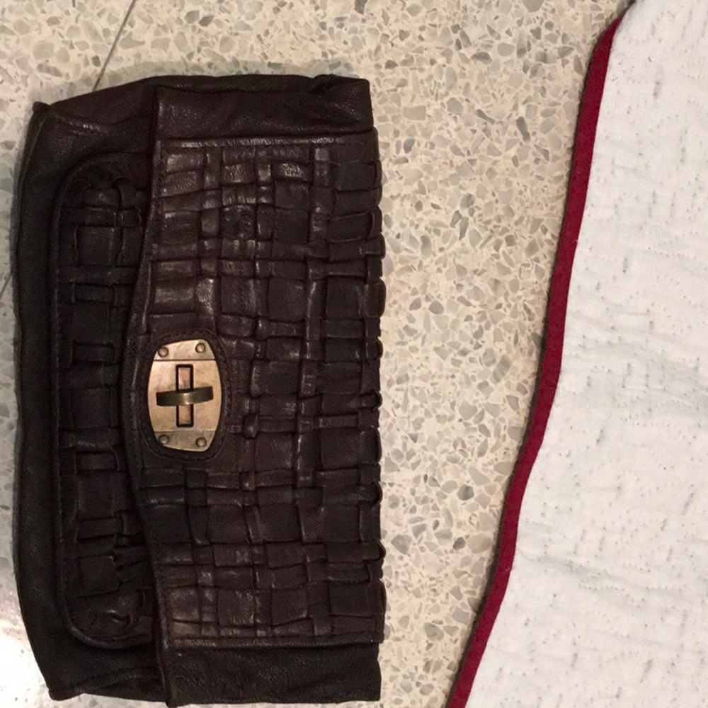 Monserrat de Luca leather, woven clutch purse